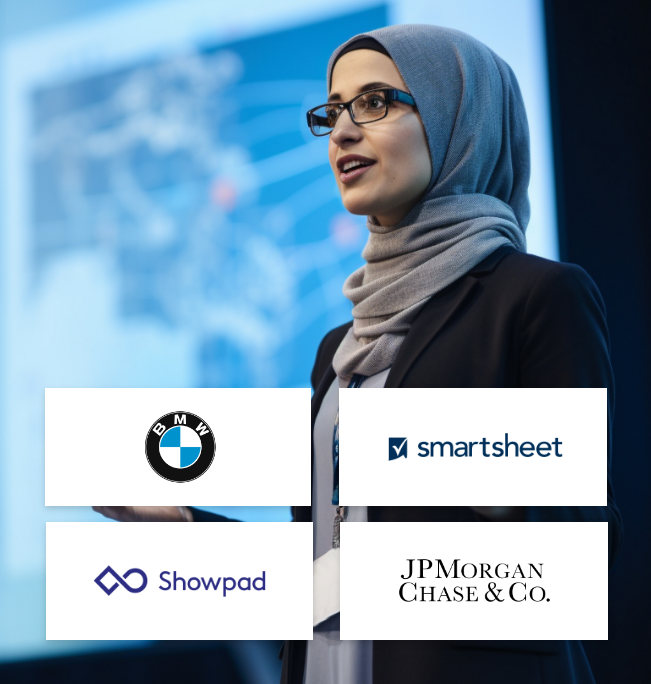 Woman presenting to group with company logos for BMW, Smartsheet, Showpad, and JPMorgan Chase